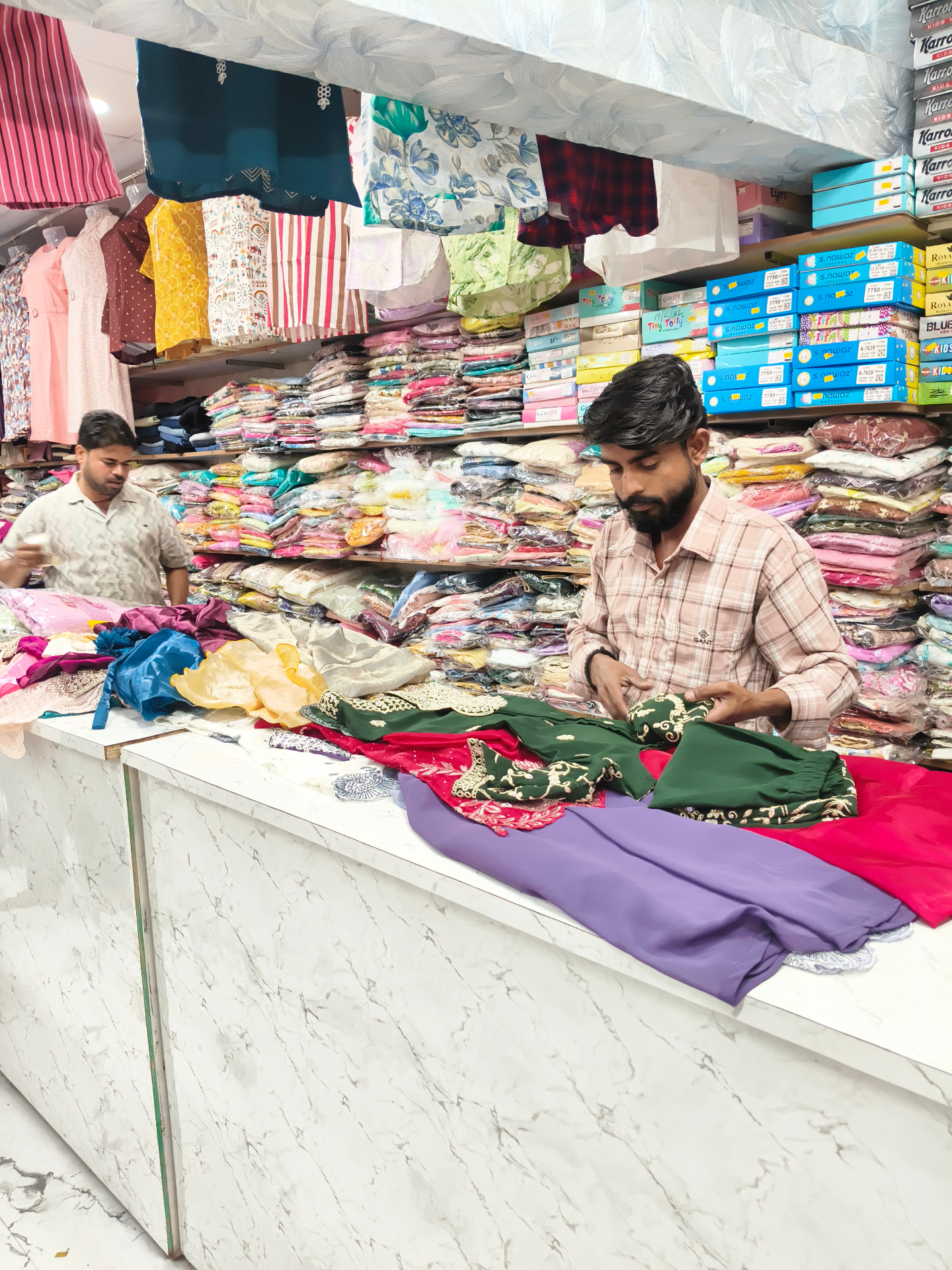 Fashion Street staff assisting with carefully selected outfits